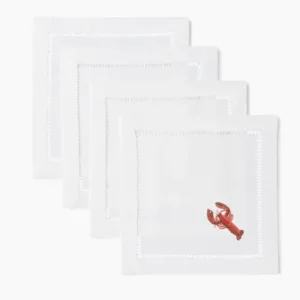 Henry Handwork white linen cocktail napkins with embroidered red lobster and hemstitch border.