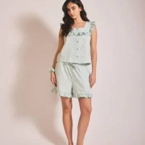 Portrait of a model wearing TBCo Cotton Pyjamas in Blue Stripe Ruffle sleeveless shorts set, gallery position 1